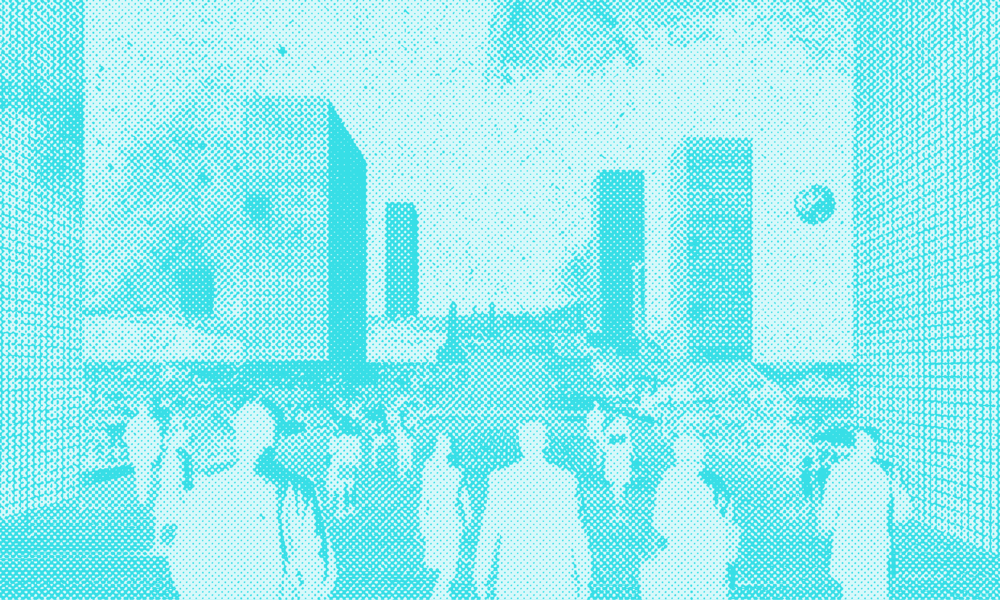 People walking in a big city flanked by skyscrapers